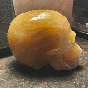 Carved Orange Calcite Skull