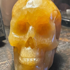 Carved Orange Calcite Skull